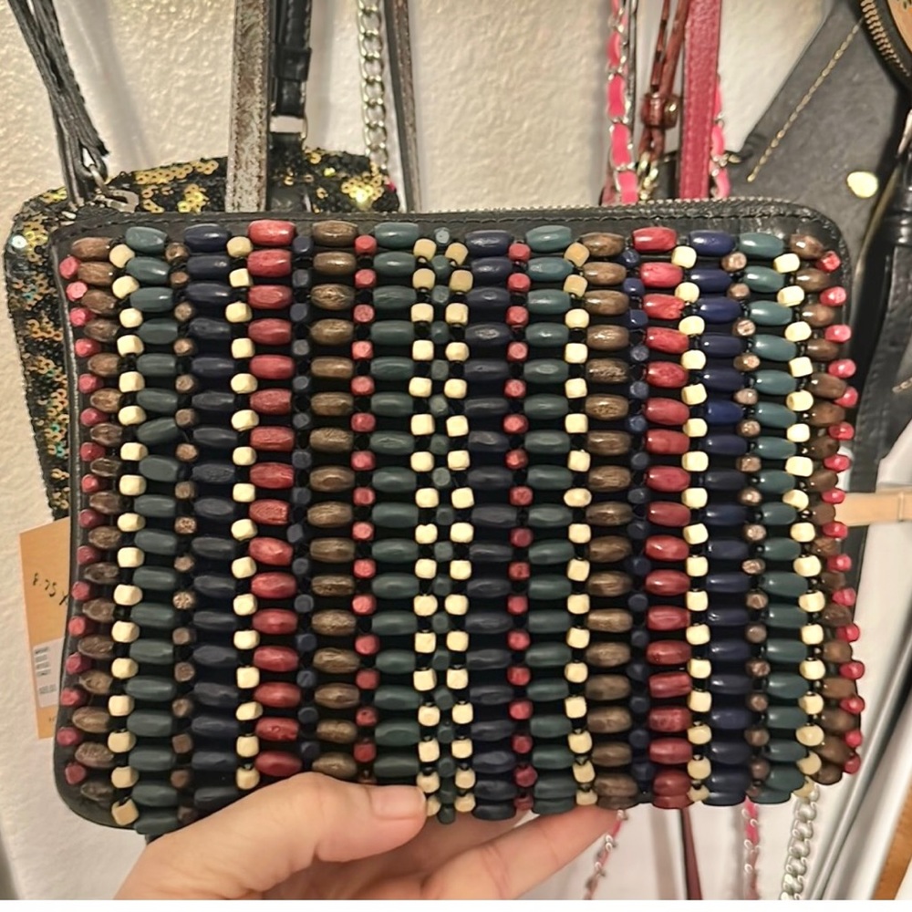 Patricia Nash NWT beaded. No damage. Comes with